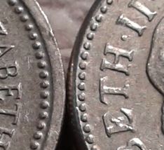One-Pound-Coins-2004-Edge-Error.